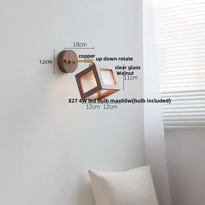Rustic walnut and brass led wall lamp with copper finish, walnut wood base, and clear glass cube fixture for dining room