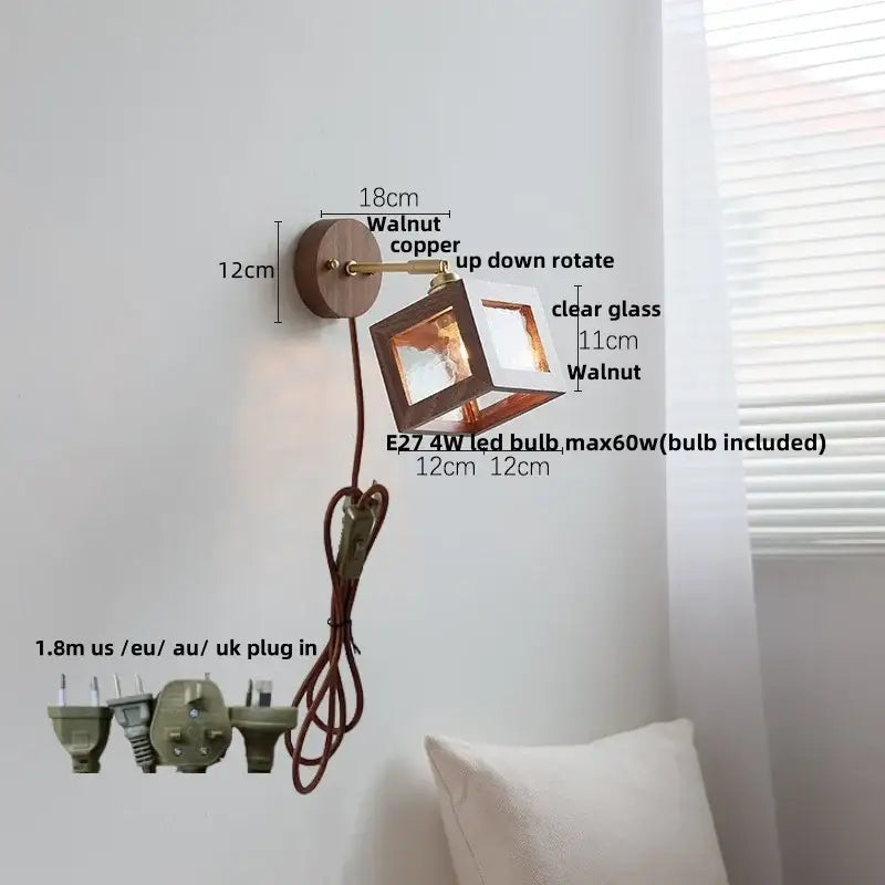 Rustic walnut wood and copper wall sconce with clear glass cube fixture for bedroom lighting
