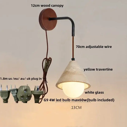 Rustic white concrete and wood wall light fixture with adjustable black wire arm and yellow travertine shade for bedroom use