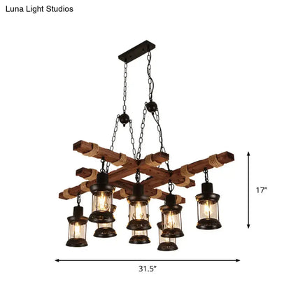 Rustic wooden lantern pendant lamp with dark metal lanterns, rope accents, and clear glass by DecorBites™