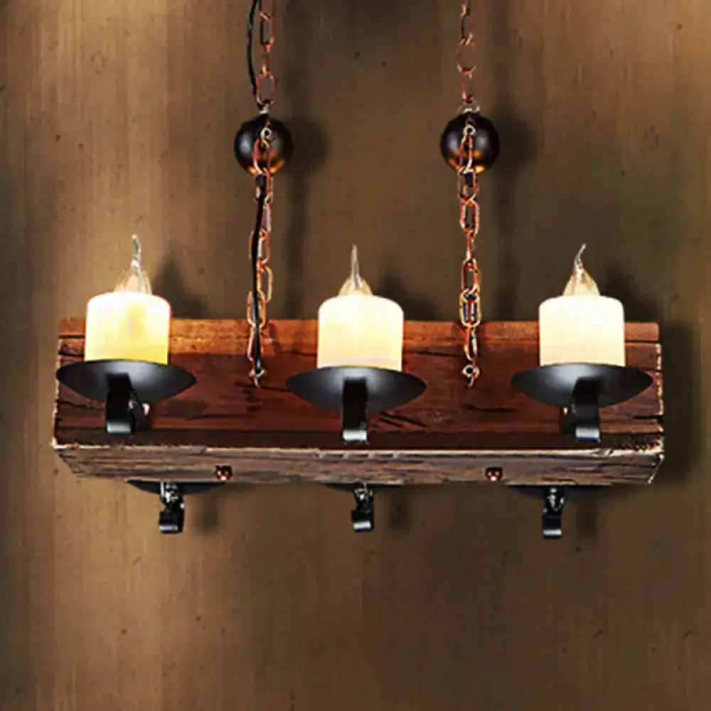 Rustic wooden candle sconce with three black metal holders and copper chains for dining room island pendant with black marble