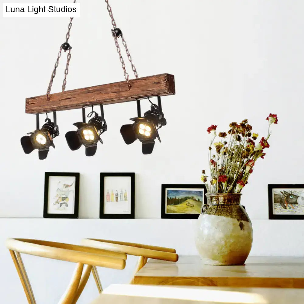 Rustic wood and black metal 3 light island pendant kitchen light with three black industrial spotlight fixtures