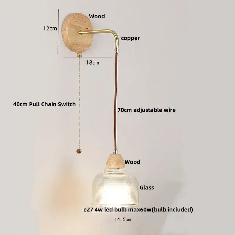 Rustic wood and brass wall light with warm tones clear glass shade and pull chain switch for easy use