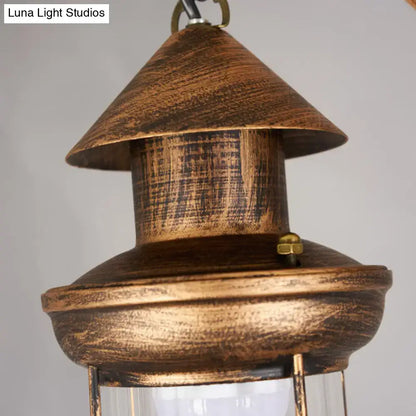 Rustic brown wooden lantern with brass accent and glass panel in decorbites™ bronze coastal 4-light island light fixture