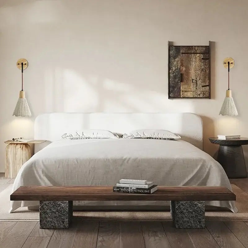 White upholstered bed with minimalist headboard paired with rustic wood and gray cement decorbites led wall light bedroom sconce