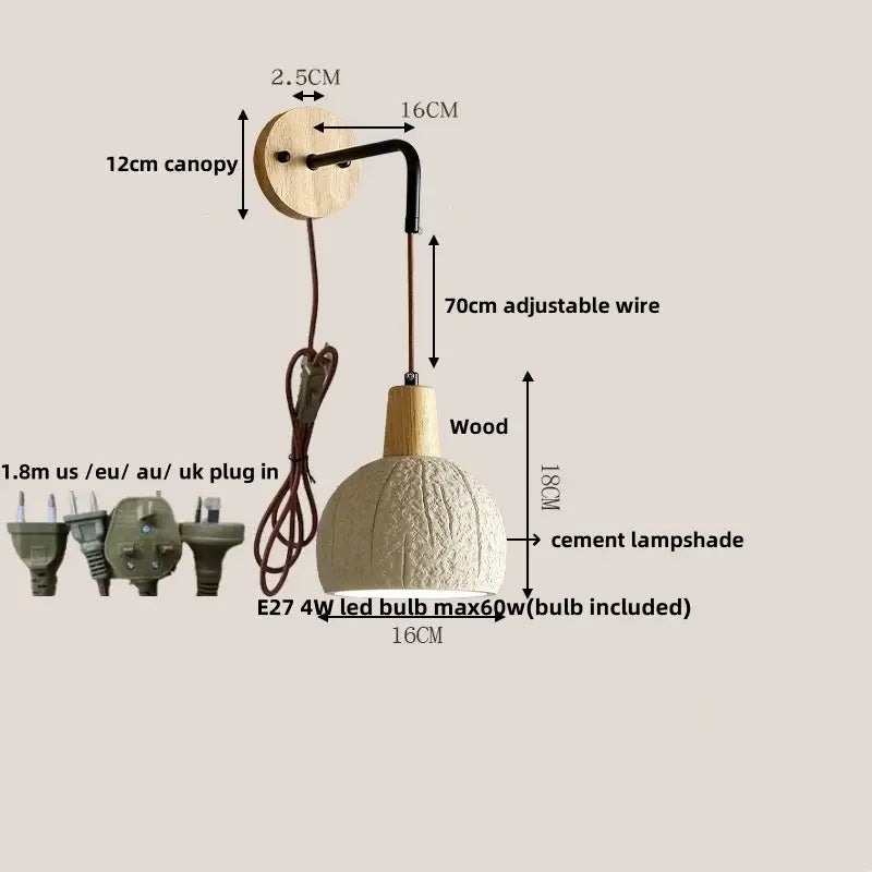 Rustic wood and gray wall light fixture with off-white cement shade, wooden canopy and stem, and adjustable black wire