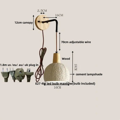 Rustic wood and gray wall light fixture with off-white cement shade, wooden canopy and stem, and adjustable black wire