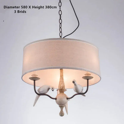 Rustic wood and iron decorbites bird lamp chandelier with beige linen shade and white bird figurines for dining room