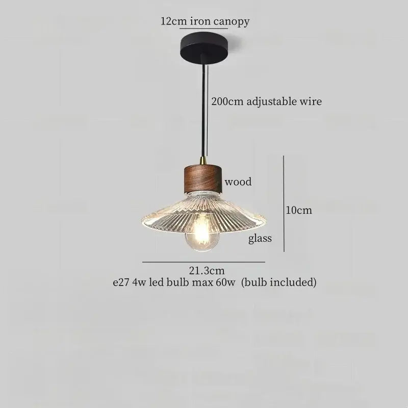 Rustic wood and ribbed glass led pendant light with black iron canopy and adjustable wire for dining room