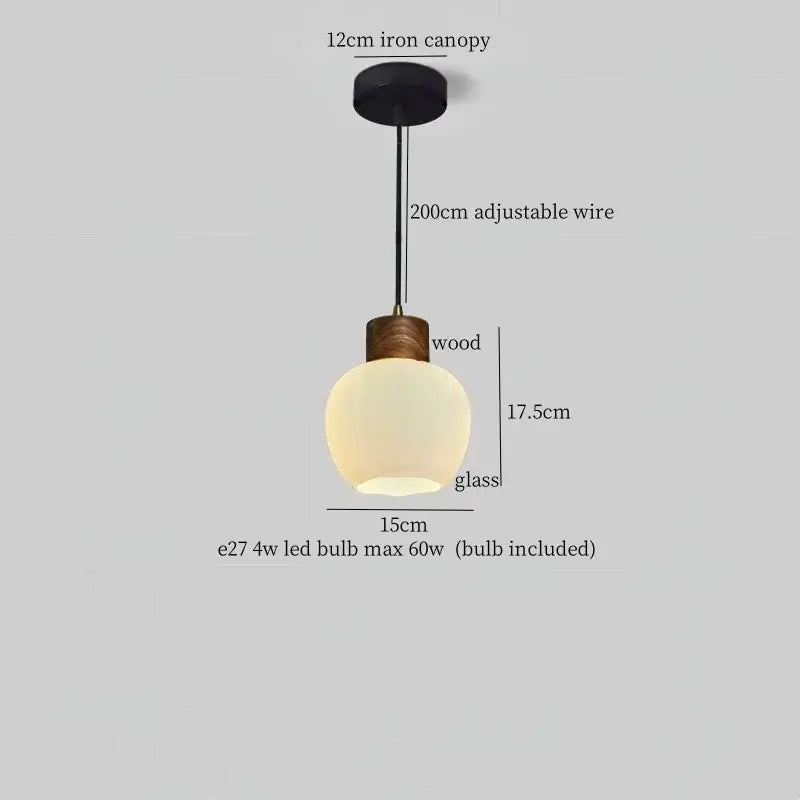 Rustic wood and ribbed glass led pendant light with matte black iron canopy and adjustable wire perfect for dining room lighting