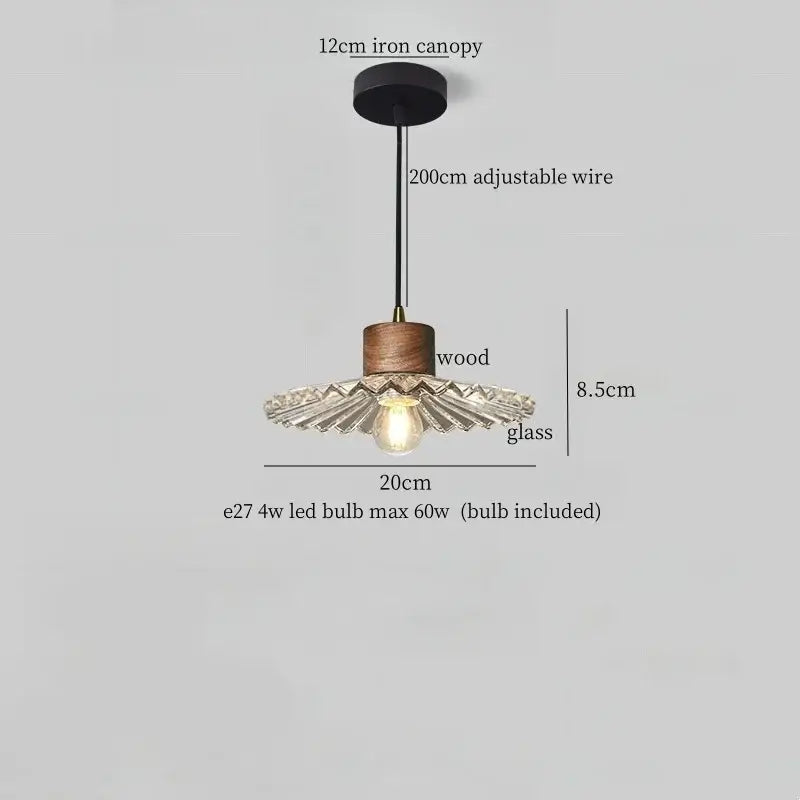 Rustic wood and ribbed glass led pendant light with black iron canopy and adjustable wire for dining room lighting