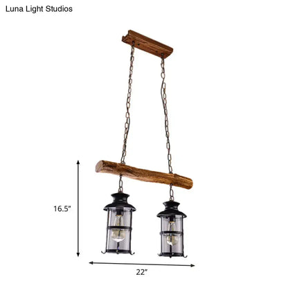 Rustic two-lamp hanging lantern chandelier with wood design and clear glass in black metal frame by DecorBites brown finish