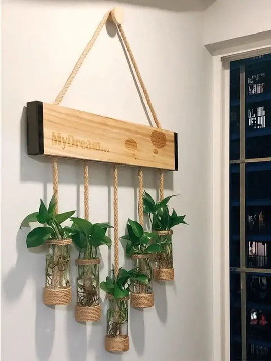 Light-colored wooden stand with engraved text and rope-wrapped glass planter vase for rustic living room decor