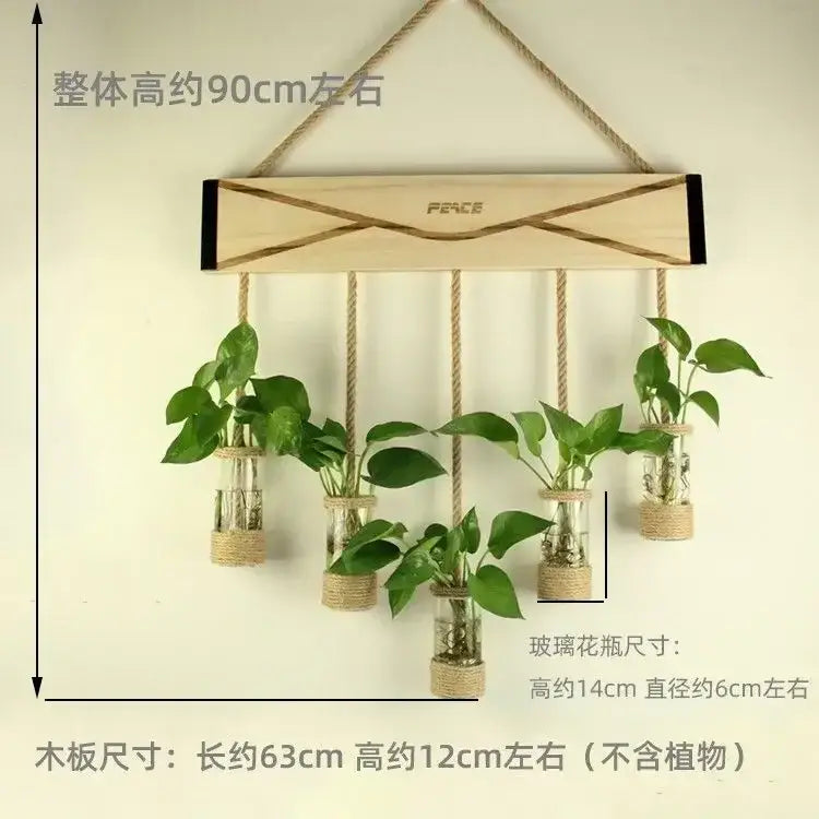 Rustic light wood hanging planter vase with five glass vases wrapped in natural twine and green leafy plants