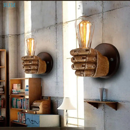Rustic wooden hand model wall lamp in a living room vintage light design featuring a glowing filament bulb wall lamp