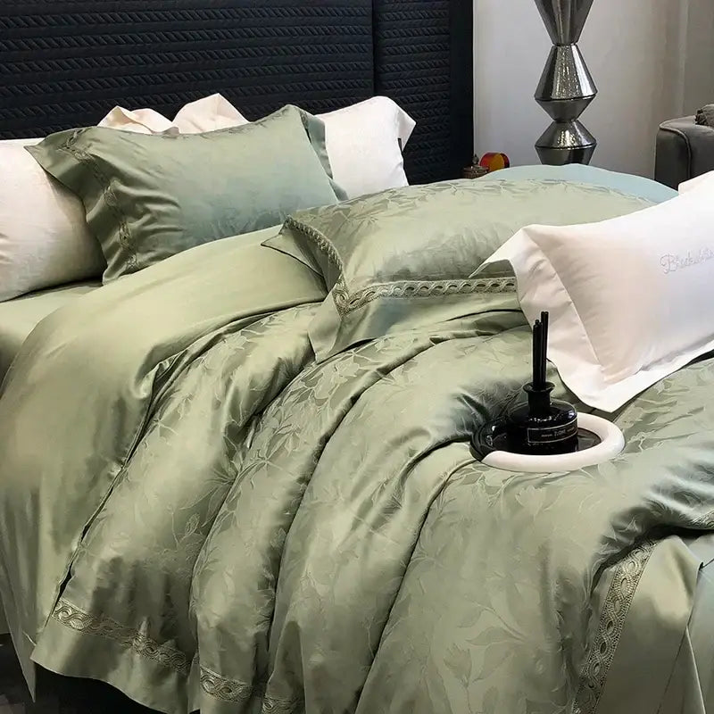 Luxurious sage green bedding set in decorbites 1000tc lyocell cotton with floral embroidery and lace trim