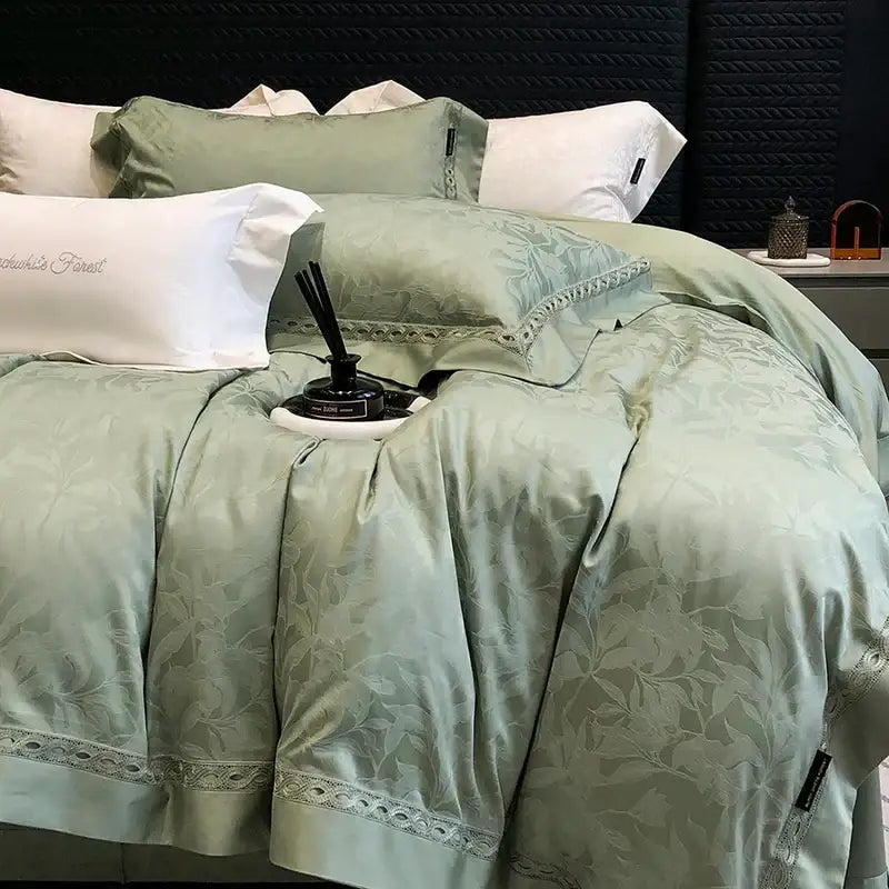 Luxury sage green satin bedding set with subtle leaf embroidery and lace trim made from decorbites 1000tc lyocell cotton