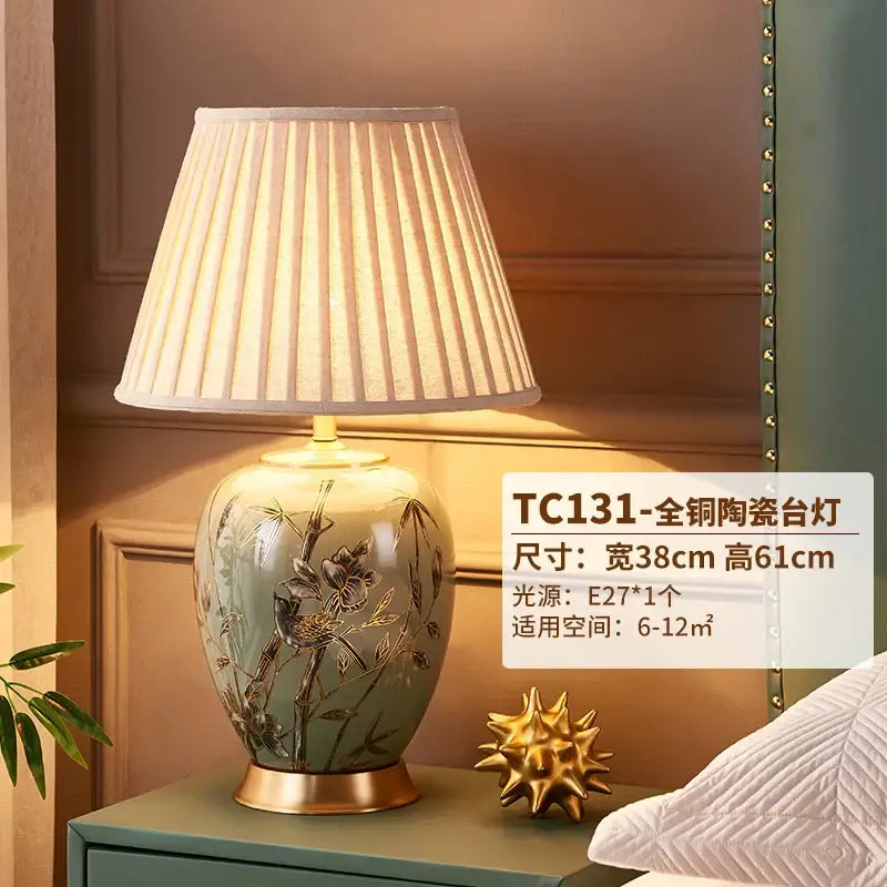 Sage green american style ceramic table lamp with hand-painted floral bird motifs and pleated off-white shade decorbites american style