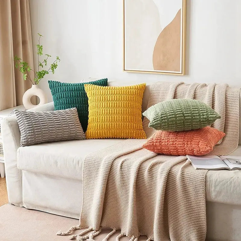 A cozy collection of textured throw pillows featuring a sage green corduroy velvet pillowcase set of 2 living room cushions