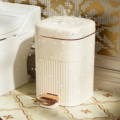 Cream-colored rectangular pedal trash can with vertical ridges and rose gold trim decorbites light luxury kitchen bin
