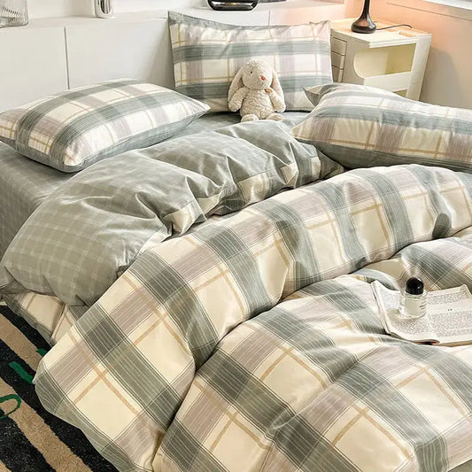 Sage green grid print cotton bedding set featuring a plaid comforter in soft sage green cream and beige tones