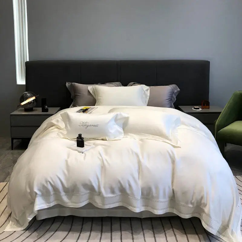 White satin cream bedding set with delicate embroidery edges made from decorbites 1000tc lyocell fibre