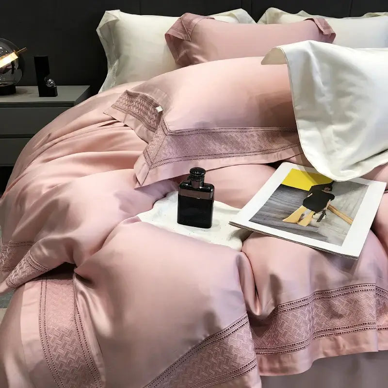 Pink satin bedding set with subtle geometric embroidery edges made from decorbites 1000tc lyocell fibre for bedroom decor