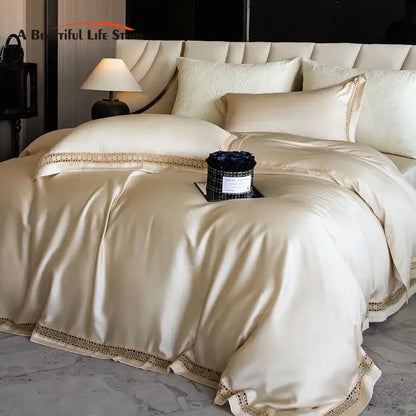 Cream-colored satin duvet cover set with delicate gold lace trim for elegant bedroom bedding and cover set