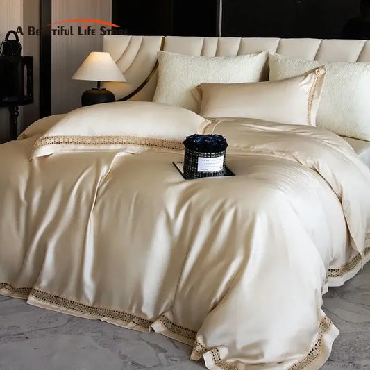 Cream-colored satin duvet cover set with delicate gold lace trim for elegant bedroom bedding and cover set