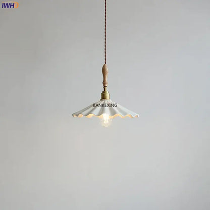 Scalloped white ceramic led pendant light with brass hardware and wooden handle for dining room by decorbites ceramic led pendant