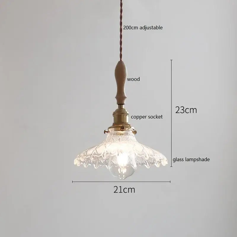 Scalloped white ceramic led pendant light with clear glass shade hanging from wooden handle and copper socket for dining room decorbites ceramic led pendant