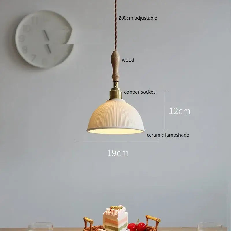 Scalloped white ceramic led pendant light with warm-toned ridged lampshade, wooden handle, and copper socket by decorbites ceramic led