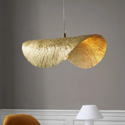 Sculptural brass lotus leaf chandelier with gold leaf fan-like textured design for dining room decorbites brass lotus