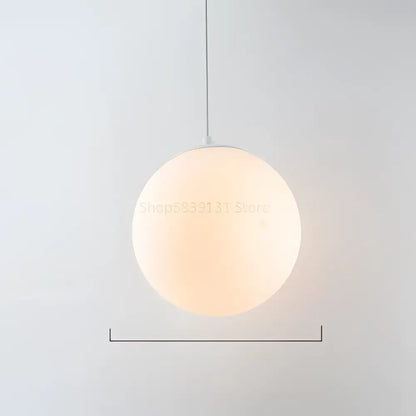 Set of 6 minimalist frosted glass ball pendant lights with warm illumination for living room decorbites glass ball pendant