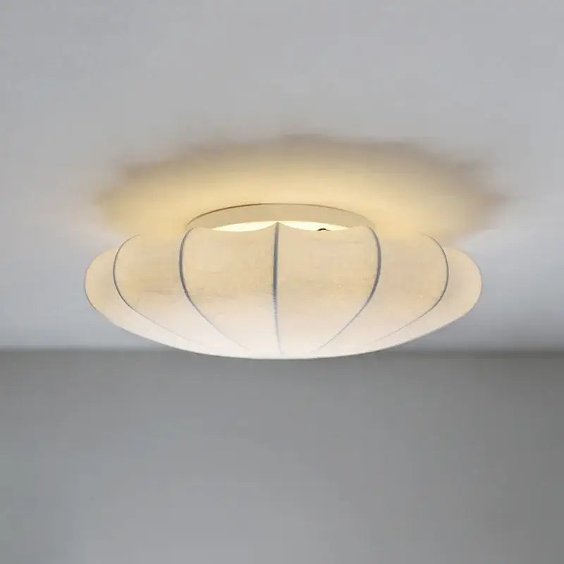 Modern off-white shell shaped cream flower pendant light with petal design and subtle black lines for dining room decorbites cream flower