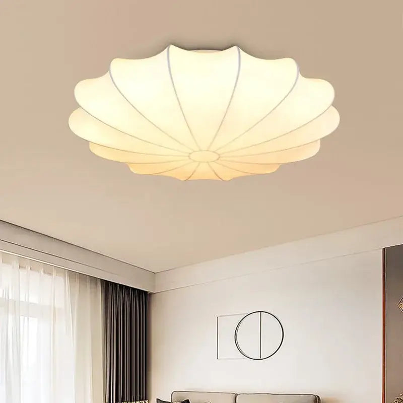 Shell shaped cream flower pendant light with off-white petals and gray stitching details for dining room decorbites cream flower