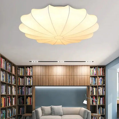 Shell shaped cream flower pendant light with petal design in cream color ideal for dining room decorbites cream flower