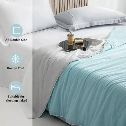 Silky light blue cooling queen quilt with white border and double-sided ab design for summer sleeping naked