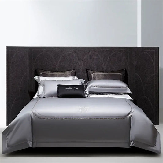 Silver cotton satin jacquard bedding set with subtle shimmering trim and lucky day black accent pillow decorbites cotton satin