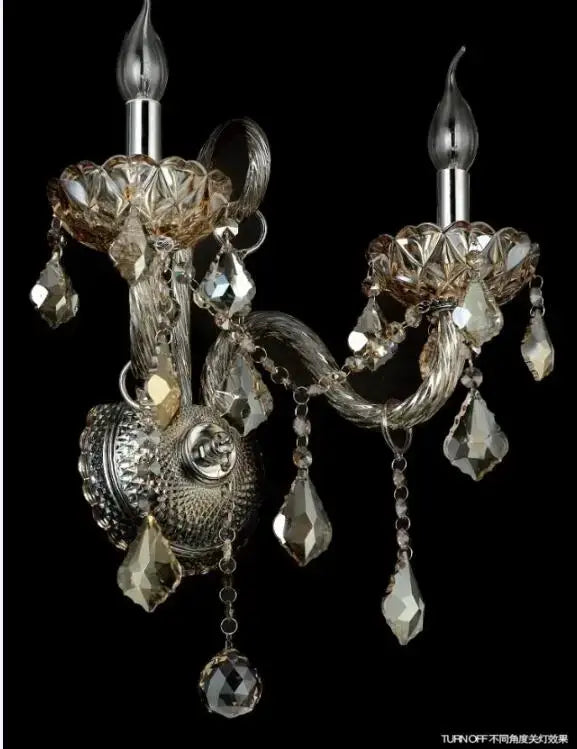 Silver-toned crystal cognac wall lamp with intricate filigree design and faceted glass droplets for luxury decorbites decor