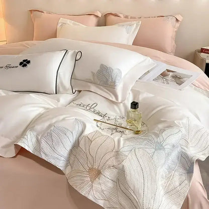 Elegant white satin bedding set with silver floral embroidery and gold thread accents in decorbites cotton king size