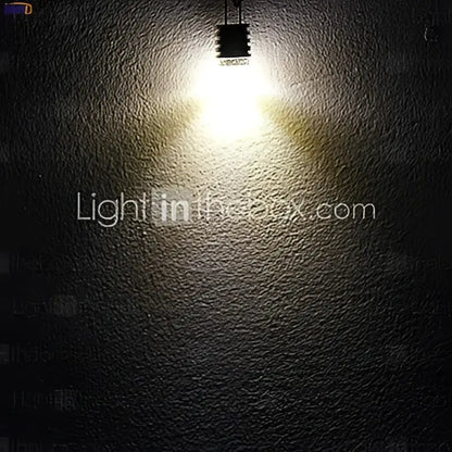 A bright white cob g4 led bulb with metallic base emitting warm light for chandelier dining room decorbites cob pack