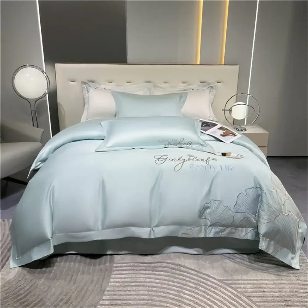 Light blue satin bedding set with silver embroidered ginkgo leaf design by decorbites 1200tc embroidery egyptian cotton