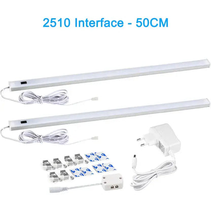 Two white 50cm led silver rectangular pir motion sensor cabinet lights with power cords for kitchen and living spaces