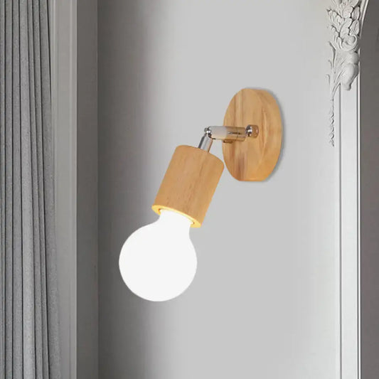 A warm-toned wooden wall sconce with a sleek chrome arm and classic bulb mini rotating for bedroom use
