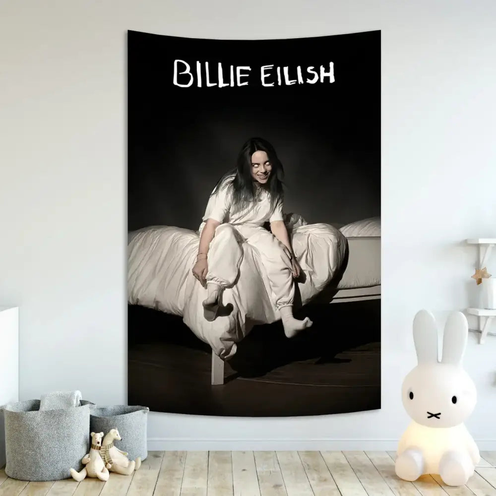 Black and white billie eilish singer tapestry banner featuring the artist seated on a bed in light clothing for wall decor
