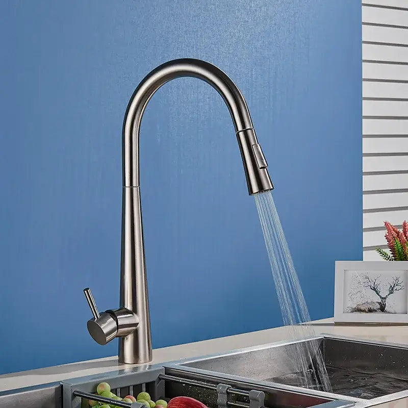 Modern brushed stainless steel kitchen faucet with sleek curved spout and pull-down spray head decorbites gold swivel