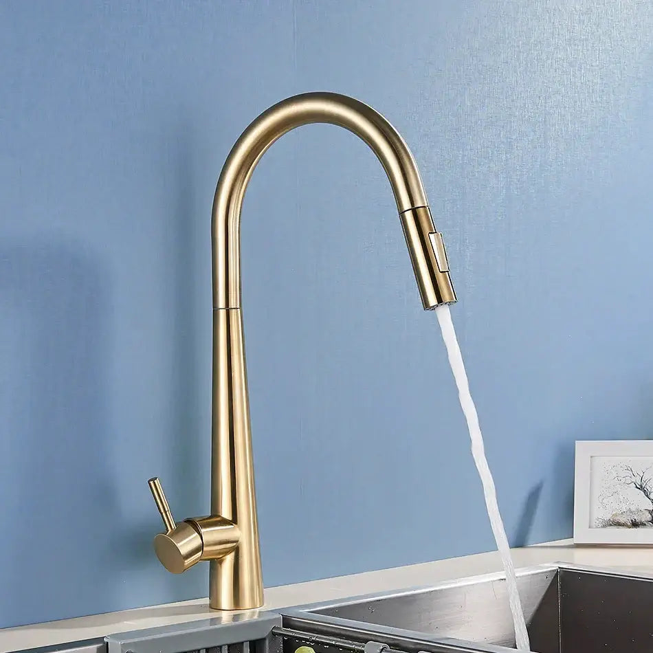 Sleek gold swivel kitchen faucet with pull-down sprayer featuring a curved spout for modern decorbites gold swivel design