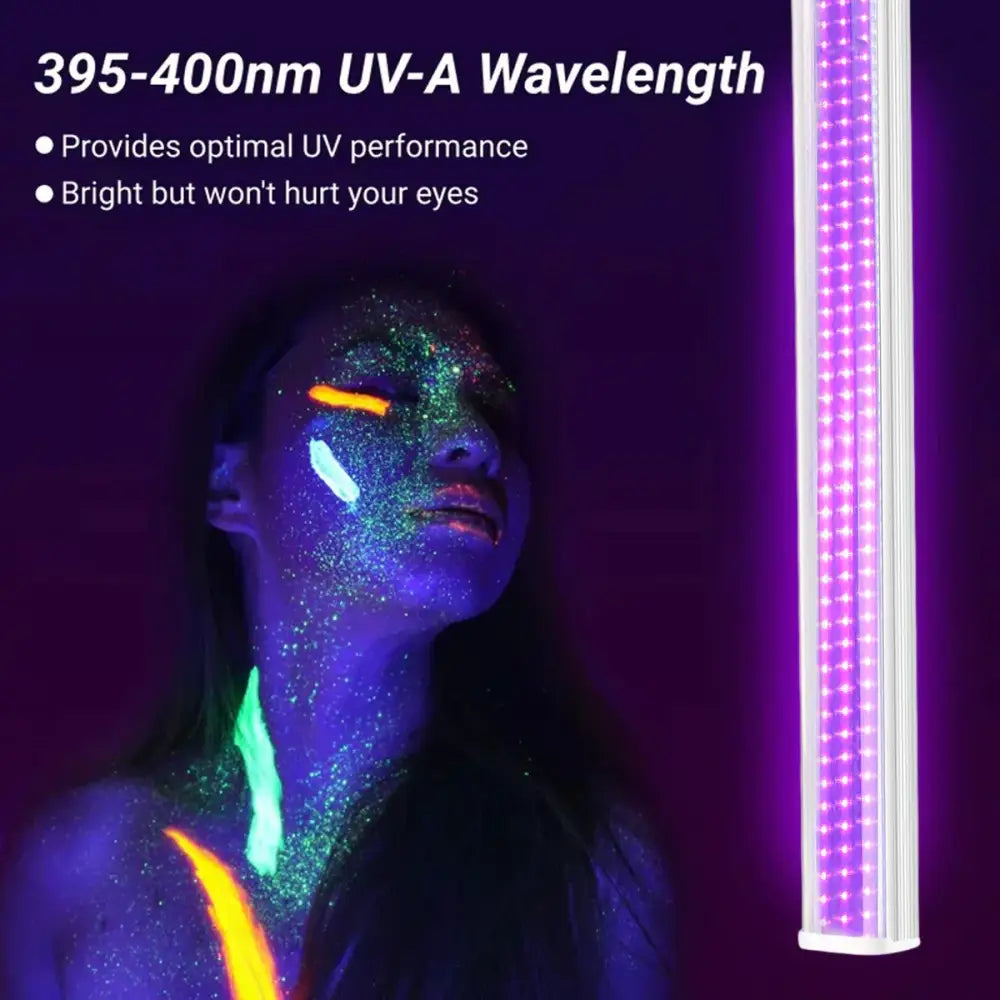 A sleek white rectangular led uv glow black light bar emitting vibrant purple light for party room decor