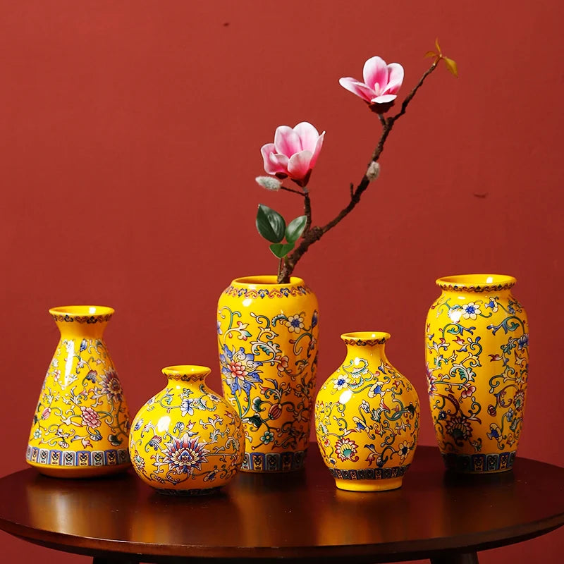Set of five vibrant yellow small ceramic vases with intricate floral patterns for handmade vintage Chinese decor